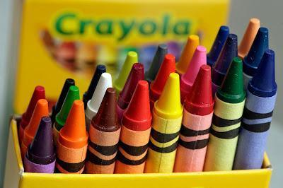 rows of different colored crayons